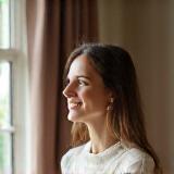 Amandine Leclerc gazing at her apartment transformation